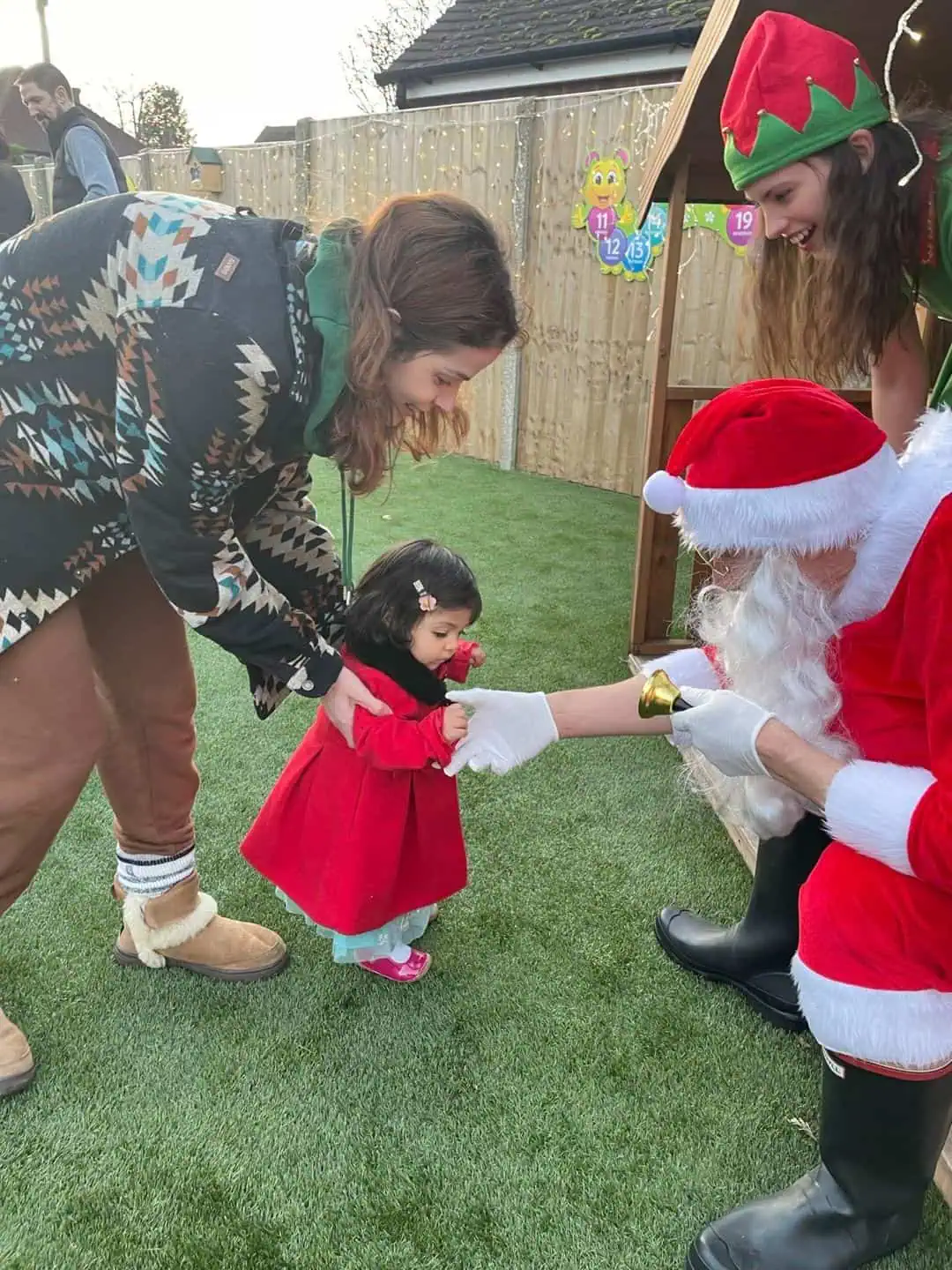 Nursery child meeting Father Christmas